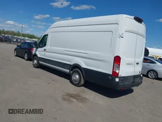 2022 Ford Transit Cargo with VIN 1FTBW3X80NKA69156, listed as a IAAI auction lot 42059236 with 100,096 mi miles and . Bid and sale history available at DreamBid. Image 3.