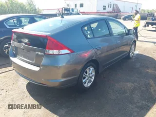 2010 Honda Insight EX with VIN JHMZE2H72AS021555, listed as a IAAI auction lot 42129289 with 172,829 mi miles and . Bid and sale history available at DreamBid. Image 4.