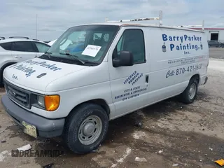 2006 Ford Econoline Cargo with VIN 1FTRE14W56HA74697, listed as a IAAI auction lot 42341374 with 153,519 mi miles and . Bid and sale history available at DreamBid. Image 2.