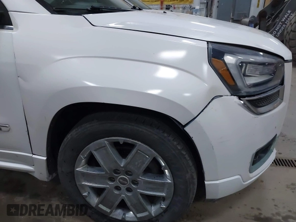 2016 GMC Acadia Denali with VIN 1GKKVTKD9GJ105401, listed as a IAAI auction lot 42055278 with 163,515 mi miles. Bid and sale history available at carsss.com. Image 6.