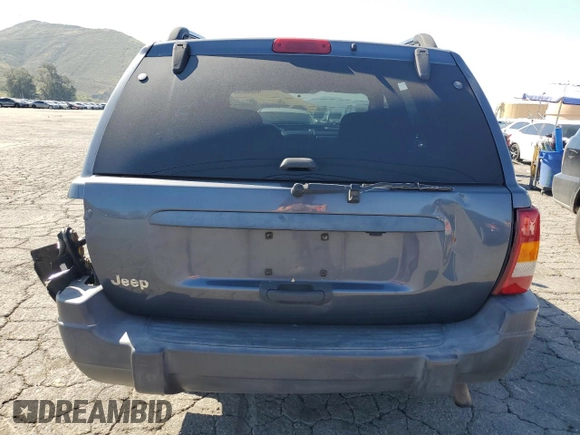 2003 Jeep Grand Cherokee Laredo with VIN 1J4GX48S73C539185, listed as a Copart auction lot 46687915 with 265,008 mi miles and Salvage Title. Bid and sale history available at carsss.com. Image 6.