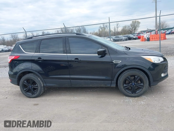 2015 Ford Escape SE with VIN 1FMCU9GX8FUC41438, listed as a IAAI auction lot 41869587 with 109,728 mi miles. Bid and sale history available at carsss.com. Image 14.