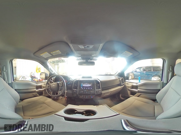 2019 Ford F-150 XL with VIN 1FTFW1E4XKFA16846, listed as a Copart auction lot 61345795 with 128,587 mi miles and Salvage title. Bid and sale history available at DreamBid. Image 14.