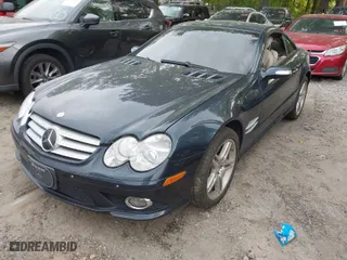 2007 Mercedes-Benz SL-Class 5.5L V8 with VIN WDBSK71F07F134494, listed as a IAAI auction lot 42032663 with 136,806 mi miles. Bid and sale history available at carsss.com. Image 2.