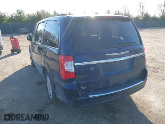 2013 Chrysler Town & Country Touring with VIN 2C4RC1BG1DR573211, listed as a IAAI auction lot 41070692 with 143,913 mi miles. Bid and sale history available at carsss.com. Image 3.