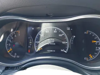 2021 Jeep Grand Cherokee Laredo E with VIN 1C4RJFAG5MC579865, listed as a IAAI auction lot 41818874 with 105,489 mi miles and . Bid and sale history available at DreamBid. Image 7.