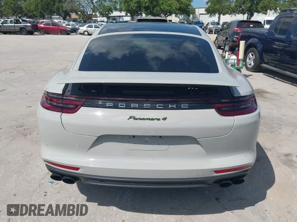 2018 Porsche Panamera 4 E-Hybrid z VIN WP0AE2A7XJL174378, wystawiony jako IAAI lot #42303125 z przebiegiem 35 636 mil mil oraz . Historia ofert i sprzedaży dostępna na DreamBid. Obrazek 16.