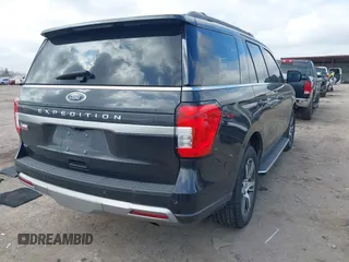 2022 Ford Expedition XLT with VIN 1FMJU1HT0NEA56894, listed as a IAAI auction lot 41450620 with 23,695 mi miles. Bid and sale history available at carsss.com. Image 4.