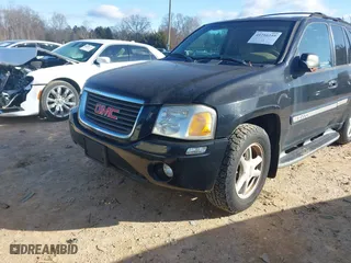 2002 GMC Envoy SLT with VIN 1GKDS13SX22440026, listed as a IAAI auction lot 41716249 with 179,141 mi miles. Bid and sale history available at carsss.com. Image 6.