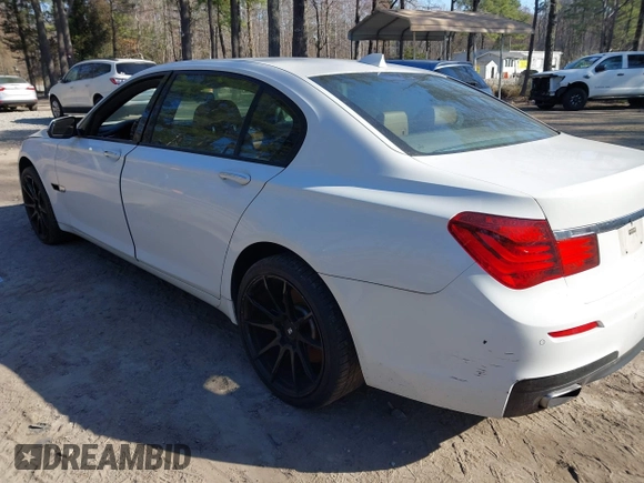 2014 BMW 7 Series 740Li with VIN WBAYE4C59ED138409, listed as a IAAI auction lot 41785423 with 121,687 mi miles. Bid and sale history available at carsss.com. Image 3.