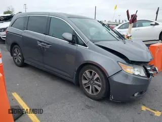 2014 Honda Odyssey Touring with VIN 5FNRL5H97EB114634, listed as a IAAI auction lot 42105220 with Not Provided miles and . Bid and sale history available at carsss.com. Image 1.