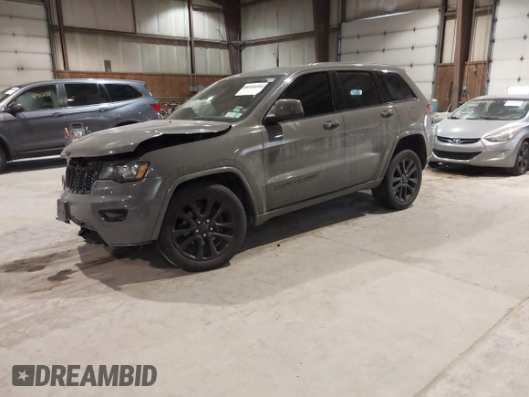 2019 Jeep Grand Cherokee Laredo E with VIN 1C4RJFAG9KC667394, listed as a IAAI auction lot 41316264 with 55,156 mi miles. Bid and sale history available at carsss.com. Image 17.