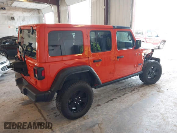 2023 Jeep Wrangler Sport with VIN 1C4HJXDG7PW676453, listed as a IAAI auction lot 42222995 with 32,347 mi miles and . Bid and sale history available at DreamBid. Image 4.