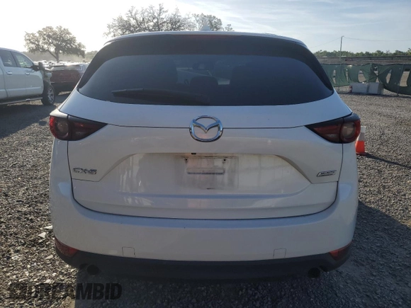2017 Mazda CX-5 Grand Touring with VIN JM3KFADL1H0141132, listed as a Copart auction lot 51755095 with 116,220 mi miles and Salvage Title. Bid and sale history available at carsss.com. Image 6.