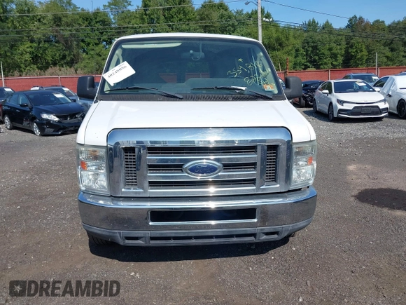 2012 Ford Econoline Passenger XL with VIN 1FBNE3BL1CDA45143, listed as a IAAI auction lot 40248086 with 83,034 mi miles. Bid and sale history available at carsss.com. Image 11.
