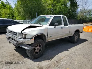 1993 Toyota Pickup DLX z VIN JT4VN13DXP5121935, wystawiony jako Copart lot #55904435 z przebiegiem 217 051 mil mil oraz Szkoda całkowita • Salvage title. Historia ofert i sprzedaży dostępna na DreamBid. Obrazek 1.