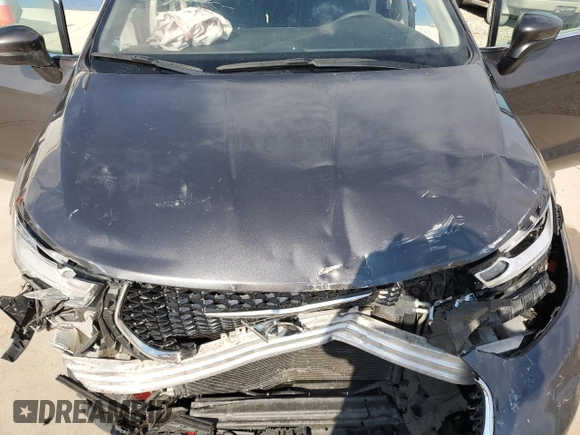 2021 Chrysler Pacifica Touring L with VIN 2C4RC1BG6PR597041, listed as a Copart auction lot 63331125 with 76,820 mi miles and Non repairable. Bid and sale history available at DreamBid. Image 12.