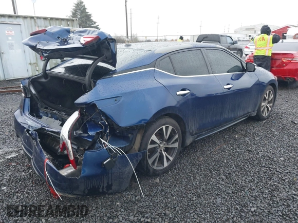 2016 Nissan Maxima SL with VIN 1N4AA6APXGC396890, listed as a IAAI auction lot 41594044 with 144,164 mi miles and . Bid and sale history available at DreamBid. Image 4.