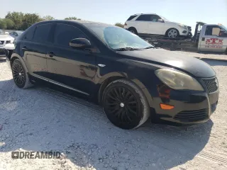 2011 Suzuki Kizashi SE z VIN JS2RE9A34B6111601, wystawiony jako Copart lot #75945784 z przebiegiem 128 926 mil mil oraz Szkoda całkowita • Salvage title. Historia ofert i sprzedaży dostępna na DreamBid. Obrazek 4.