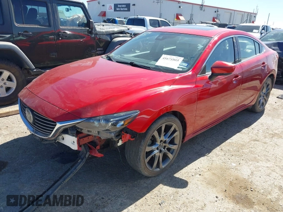 2017 Mazda 6 Grand Touring with VIN JM1GL1W52H1139776, listed as a IAAI auction lot 41671005 with 40,884 mi miles and . Bid and sale history available at DreamBid. Image 18.