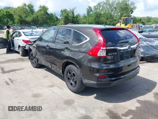 2015 Honda CR-V LX with VIN 2HKRM4H38FH601802, listed as a IAAI auction lot 42177101 with 71,775 mi miles and . Bid and sale history available at DreamBid. Image 3.