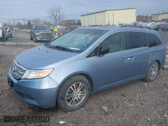 2012 Honda Odyssey EX-L with VIN 5FNRL5H60CB051959, listed as a IAAI auction lot 41967908 with Not Provided miles and . Bid and sale history available at carsss.com. Image 2.