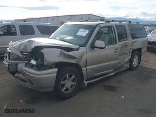 2002 GMC Yukon XL Denali with VIN 1GKFK66U42J264891, listed as a IAAI auction lot 40545926 with 232,303 mi miles. Bid and sale history available at carsss.com. Image 2.