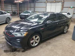 2021 Volkswagen Jetta GLI S z VIN 3VW6T7BU1MM075705, wystawiony jako Copart lot #58194975 z przebiegiem 82 459 mil mil oraz Czysty tytuł • Clean title. Historia ofert i sprzedaży dostępna na DreamBid. Obrazek 1.