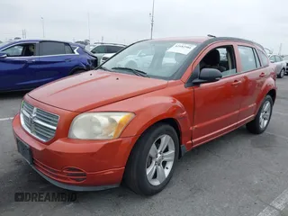 2010 Dodge Caliber SXT with VIN 1B3CB4HA9AD586821, listed as a IAAI auction lot 42182586 with 138,503 mi miles and . Bid and sale history available at DreamBid. Image 2.
