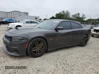 2019 Dodge Charger Scat Pack z VIN 2C3CDXGJ9KH756843, wystawiony jako Copart lot #88870015 z przebiegiem 57 260 mil mil oraz Szkoda całkowita • Salvage title. Historia ofert i sprzedaży dostępna na DreamBid. Obrazek 1.