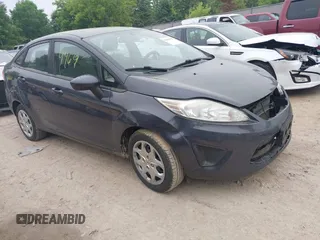 2013 Ford Fiesta S z VIN 3FADP4AJ9DM175576, wystawiony jako IAAI lot #42449969 z przebiegiem 123 959 mil mil oraz . Historia ofert i sprzedaży dostępna na DreamBid. Obrazek 1.