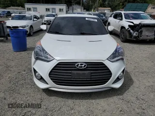 2013 Hyundai Veloster Turbo z VIN KMHTC6AE2DU163017, wystawiony jako Copart lot #56804365 z przebiegiem 105 325 mil mil oraz Czysty tytuł • Clean title. Historia ofert i sprzedaży dostępna na DreamBid. Obrazek 5.