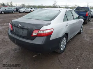 2009 Toyota Camry Hybrid with VIN 4T1BB46K89U063643, listed as a IAAI auction lot 42088615 with 245,820 mi miles. Bid and sale history available at carsss.com. Image 4.