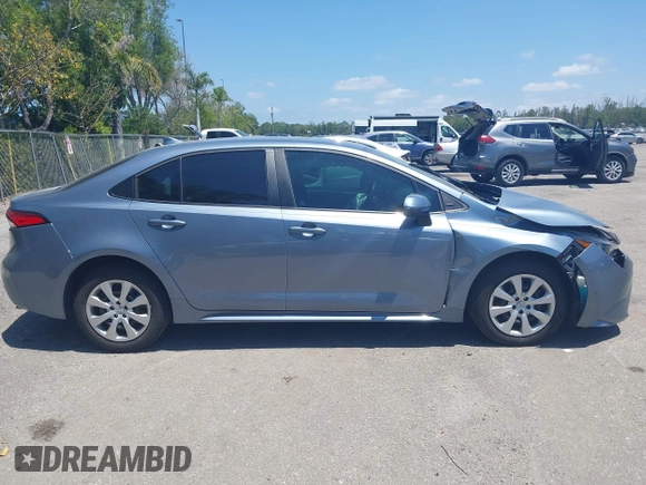 2023 Toyota Corolla LE with VIN 5YFB4MDE9PP016692, listed as a IAAI auction lot 42136141 with 34,671 mi miles and . Bid and sale history available at carsss.com. Image 13.