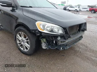 2016 Volvo XC60 T5 Drive-E Premier z VIN YV440MDK6G2907836, wystawiony jako IAAI lot #42133307 z przebiegiem 78 109 mil mil oraz . Historia ofert i sprzedaży dostępna na DreamBid. Obrazek 6.