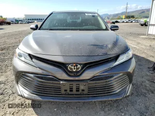 2019 Toyota Camry LE z VIN 4T1B11HKXKU209352, wystawiony jako Copart lot #52219645 z przebiegiem 23 136 mil mil oraz Szkoda całkowita • Salvage title. Historia ofert i sprzedaży dostępna na DreamBid. Obrazek 5.