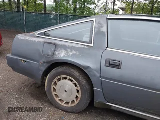 1987 Nissan 300ZX z VIN JN1HZ14S6HX217908, wystawiony jako IAAI lot #42271417 z przebiegiem 195 466 mil mil oraz . Historia ofert i sprzedaży dostępna na DreamBid. Obrazek 6.