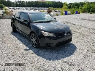 2012 Scion tC z VIN JTKJF5C72C3044845, wystawiony jako Copart lot #57863765 z przebiegiem 220 967 mil mil oraz Szkoda całkowita • Salvage title. Historia ofert i sprzedaży dostępna na DreamBid. Obrazek 13.