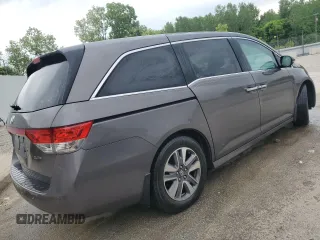 2015 Honda Odyssey Touring Elite with VIN 5FNRL5H95FB117985, listed as a Copart auction lot 57178695 with 199,757 mi miles and Non repairable. Bid and sale history available at DreamBid. Image 3.
