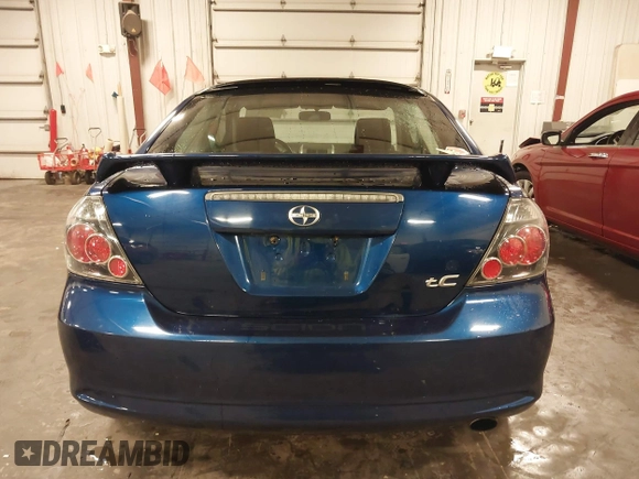 2009 Scion tC with VIN JTKDE167990297921, listed as a IAAI auction lot 41720687 with 159,960 mi miles. Bid and sale history available at carsss.com. Image 17.