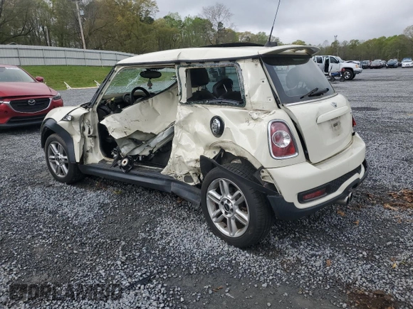 2011 MINI Hardtop S with VIN WMWSV3C52BTY12370, listed as a Copart auction lot 50235085 with Not Provided miles and Salvage Title. Bid and sale history available at DreamBid. Image 2.