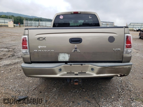 2006 Mitsubishi Raider z VIN 1Z3HT48N36S540902, wystawiony jako Copart lot #73397504 z przebiegiem 126 311 mil mil oraz Czysty tytuł • Clean title. Historia ofert i sprzedaży dostępna na DreamBid. Obrazek 6.