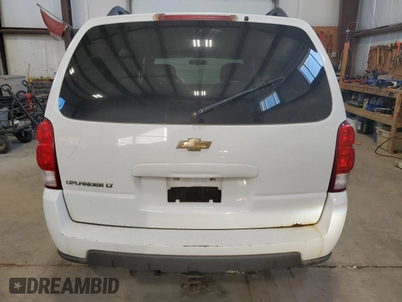 2009 Chevrolet Uplander with VIN 1GNDU33159D114410, listed as a Copart auction lot 77409814 with 247,968 mi miles and Salvage Title. Bid and sale history available at DreamBid. Image 6.