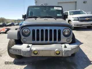 2015 Jeep Wrangler Unlimited Freedom with VIN 1C4HJWDG0FL598947, listed as a Copart auction lot 61794214 with 125,778 mi miles and Salvage title. Bid and sale history available at DreamBid. Image 5.