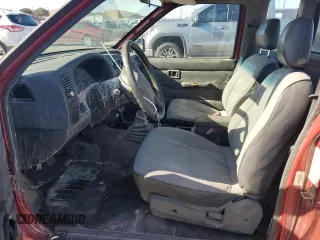 1994 Nissan Frontier XE with VIN 1N6SD16S5RC335548, listed as a Copart auction lot 84459184 with 138,698 mi miles and Salvage title. Bid and sale history available at DreamBid. Image 7.