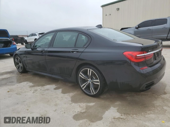 2018 BMW 7 Series ALPINA B7 xDrive with VIN WBA7F2C5XJG423853, listed as a Copart auction lot 88920175 with 124,652 mi miles and Salvage Title. Bid and sale history available at carsss.com. Image 2.
