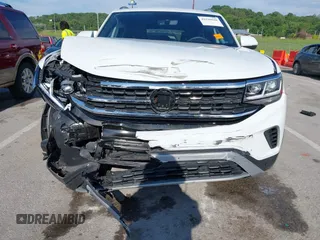 2023 Volkswagen Atlas SE with VIN 1V2WC2CA3PC228213, listed as a IAAI auction lot 42330049 with 21,884 mi miles and . Bid and sale history available at DreamBid. Image 6.