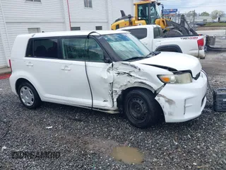 2014 Scion xB z VIN JTLZE4FE8EJ054316, wystawiony jako IAAI lot #42108489 z przebiegiem 154 409 mil mil oraz . Historia ofert i sprzedaży dostępna na DreamBid. Obrazek 1.