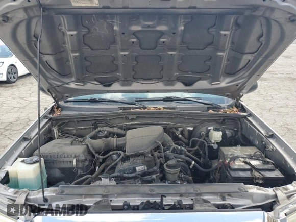 2014 Toyota Tacoma z VIN 5TFTX4CN7EX037942, wystawiony jako Copart lot #56764955 z przebiegiem 167 757 mil mil oraz Czysty tytuł • Clean title. Historia ofert i sprzedaży dostępna na DreamBid. Obrazek 11.