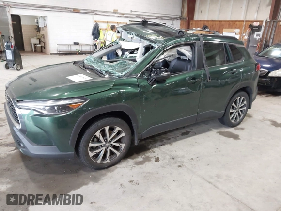 2022 Toyota Corolla Cross XLE with VIN 7MUDAABG9NV043308, listed as a IAAI auction lot 42467615 with 45,502 mi miles and . Bid and sale history available at DreamBid. Image 2.